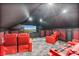 Home theater featuring comfortable seating, large screen, and sophisticated design at 9905 Lanai View Ct, Windermere, FL 34786