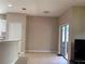 Inviting dining room featuring tile flooring and sliding glass doors for seamless indoor-outdoor living at 11039 Prairie Hawk Dr, Orlando, FL 32837