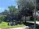 Attractive one-story home with palm trees and lush landscaping in a well-kept neighborhood at 11039 Prairie Hawk Dr, Orlando, FL 32837