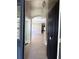 Welcoming foyer with tile flooring, showcasing an arched entryway and French doors enhancing the home's bright interior at 11039 Prairie Hawk Dr, Orlando, FL 32837