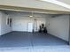 Spacious garage with a sealed floor, overhead lighting, and ample storage space at 11039 Prairie Hawk Dr, Orlando, FL 32837
