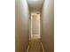 Hallway view featuring neutral walls and tile flooring at 11039 Prairie Hawk Dr, Orlando, FL 32837