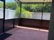 A spacious screened-in patio with a view of a private, fenced backyard providing a perfect outdoor space at 11039 Prairie Hawk Dr, Orlando, FL 32837