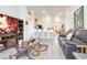 Open-concept living room featuring gray vinyl floors, perfect for entertaining at 1014 Prey Ct, Kissimmee, FL 34746