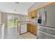 Functional kitchen with stainless steel appliances and ample cabinet space at 107 Whitehall Way, Kissimmee, FL 34758