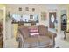 Cozy living room area with tile flooring, perfect for relaxing and entertaining guests at 1197 E Grove Ave, Lake Wales, FL 33853