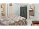 Spacious main bedroom showing closet and entrance to other rooms in the home at 1197 E Grove Ave, Lake Wales, FL 33853