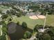 Aerial view of baseball fields, ponds, and green spaces at 12021 Villanova Dr # 111, Orlando, FL 32837