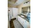 Bathroom includes a shower/tub combo, granite countertops, and ample storage space at 12021 Villanova Dr # 111, Orlando, FL 32837