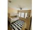 bedroom featuring bunk beds, ceiling fan, and natural light at 12021 Villanova Dr # 111, Orlando, FL 32837
