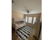 Well-lit bedroom with bunk bed and decorative starfish rug at 12021 Villanova Dr # 111, Orlando, FL 32837