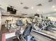 Well-equipped fitness center featuring modern cardio machines, weights, and mirrored walls at 12021 Villanova Dr # 111, Orlando, FL 32837