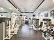 Fully equipped gym featuring weight machines, free weights, and ample workout space at 12021 Villanova Dr # 111, Orlando, FL 32837