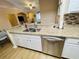 Well-lit kitchen featuring stainless steel appliances and granite countertops at 12021 Villanova Dr # 111, Orlando, FL 32837