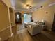 Bright living room space with lots of light and ceiling fan at 12021 Villanova Dr # 111, Orlando, FL 32837