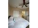 Comfortable main bedroom with a ceiling fan and closet at 12021 Villanova Dr # 111, Orlando, FL 32837