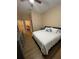 Main bedroom with hardwood floors and a walk-in closet at 12021 Villanova Dr # 111, Orlando, FL 32837