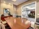 Conference room featuring a large meeting table, comfortable seating, and elegant decor at 12021 Villanova Dr # 111, Orlando, FL 32837