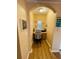 Small office space with wood floors, a desk and chair, and a small window at 12021 Villanova Dr # 111, Orlando, FL 32837