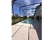 Enjoy the outdoors in this pool and enclosed lanai with a beautiful blue sky view at 123 Moss Bluff Rd, Kissimmee, FL 34746