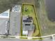 Aerial view outlining the property highlighting the spacious backyard, solar panels, and nearby community pool at 14081 Gullstrand Ave, Orlando, FL 32827