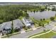 Aerial view of the property, showcasing its location near a serene lake and lush green landscape at 14081 Gullstrand Ave, Orlando, FL 32827