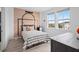 Bedroom with black and white striped bedding and basketball themed decor at 14081 Gullstrand Ave, Orlando, FL 32827