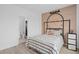 Bedroom featuring black and white bedding, basketball decor, and connected bathroom at 14081 Gullstrand Ave, Orlando, FL 32827