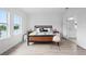 Well-lit bedroom featuring a modern bed and minimalist decor at 14081 Gullstrand Ave, Orlando, FL 32827