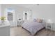 Charming bedroom with study area, decorated with modern furnishings and ample light at 14081 Gullstrand Ave, Orlando, FL 32827