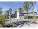Exterior of a restaurant and market with palm trees and ample parking at 14081 Gullstrand Ave, Orlando, FL 32827