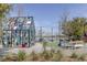 The site boasts a captivating art house near a beautiful lake and park benches at 14081 Gullstrand Ave, Orlando, FL 32827