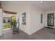 Cozy front porch featuring brick pavers, rocking chairs, and ample space for relaxing and enjoying the outdoors at 14081 Gullstrand Ave, Orlando, FL 32827