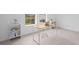 Bright home office with modern desk, large windows, and stylish decor at 14081 Gullstrand Ave, Orlando, FL 32827