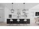 Kitchen with a large island with pendant lighting and white countertops with seating at 14081 Gullstrand Ave, Orlando, FL 32827