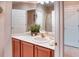 Bathroom with single sink vanity with white countertop at 142 Largo Dr, Poinciana, FL 34759