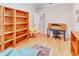 Bedroom with a ceiling fan, natural light, and hardwood floors at 142 Largo Dr, Poinciana, FL 34759