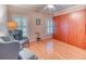 Spacious bedroom featuring hardwood floors, natural light, and a large built-in closet at 142 Largo Dr, Poinciana, FL 34759