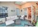 Beautiful outdoor space with comfortable seating and bright accents providing a relaxing atmosphere at 142 Largo Dr, Poinciana, FL 34759