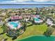 Aerial view showing pool, clubhouse, and lake at 224 Valencia Ridge Dr, Auburndale, FL 33823