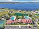 An aerial view showing the community center with tennis courts and pool at 224 Valencia Ridge Dr, Auburndale, FL 33823