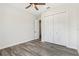 Bedroom featuring wood-look flooring, closet, and a ceiling fan at 224 Valencia Ridge Dr, Auburndale, FL 33823