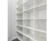 Walk-in closet featuring built-in shelving and ample storage space at 224 Valencia Ridge Dr, Auburndale, FL 33823