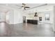 The spacious kitchen features modern appliances, an island with bar seating, and recessed lighting at 224 Valencia Ridge Dr, Auburndale, FL 33823