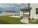 Inviting backyard showcasing a pool with water features, covered patio, and manicured lawn at 2508 W End Dr, St Cloud, FL 34772