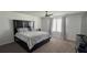 Spacious main bedroom featuring a king-size bed, plush carpeting, and soft natural light at 2508 W End Dr, St Cloud, FL 34772
