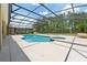 Screened in pool with hot tub and nice landscaping at 256 Yellow Snapdragon Dr, Davenport, FL 33837