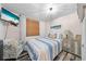 Charming bedroom featuring a striped bedspread, nautical decor, and a modern television at 2571 Ames Haven Rd, Kissimmee, FL 34744
