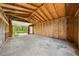 Spacious garage with exposed framing, offering ample storage and project space at 2571 Ames Haven Rd, Kissimmee, FL 34744