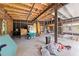 Unfinished garage with ample storage, providing potential for customization at 2571 Ames Haven Rd, Kissimmee, FL 34744
